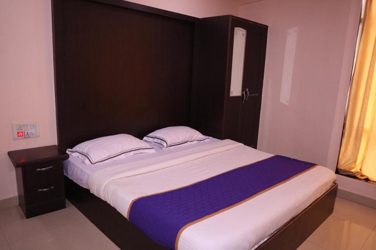 Smilestay Bns Lodge Bangalore Extérieur photo